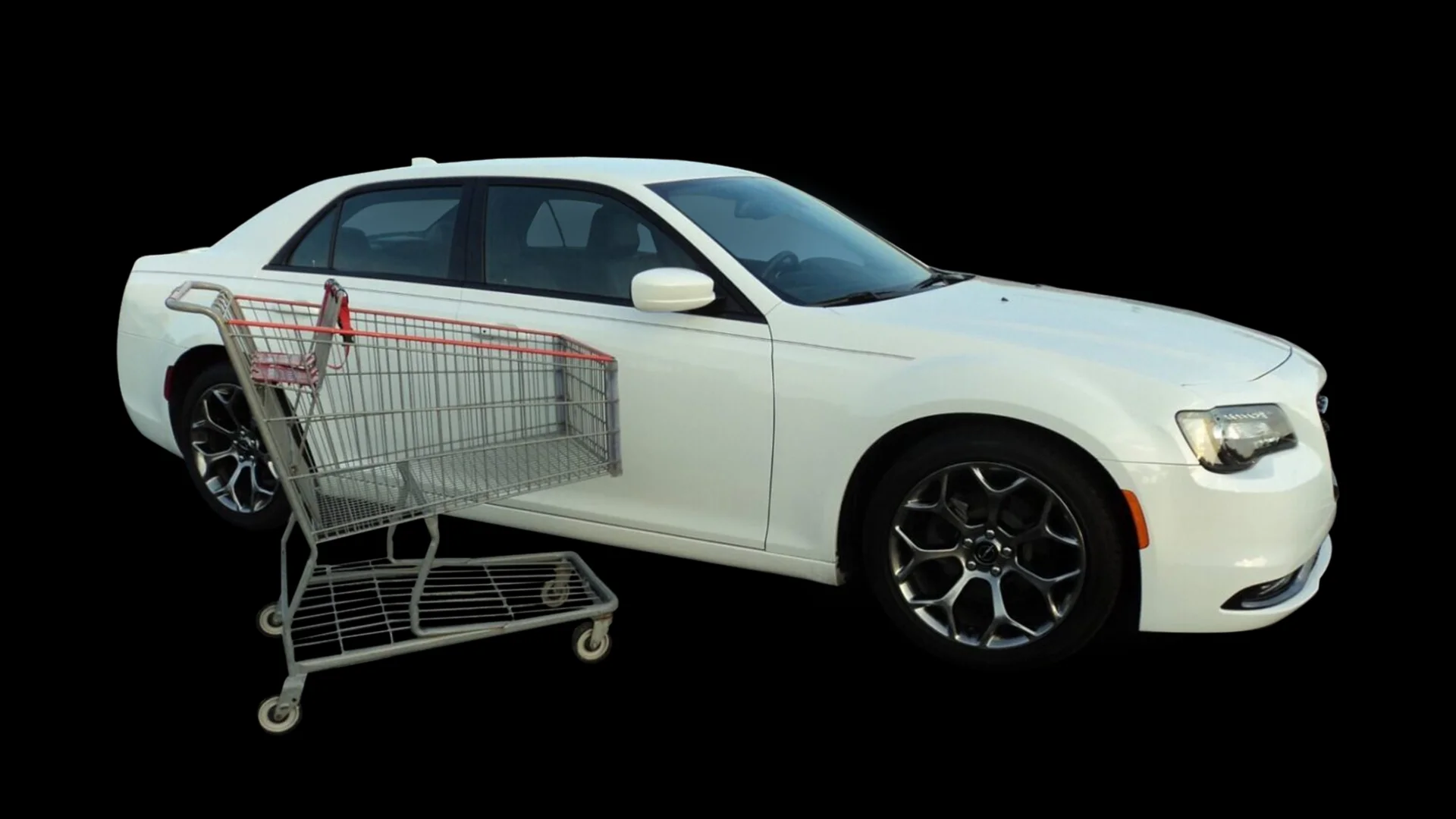 Shopping cart beside a vehicle, representing common parking-lot dent damage
